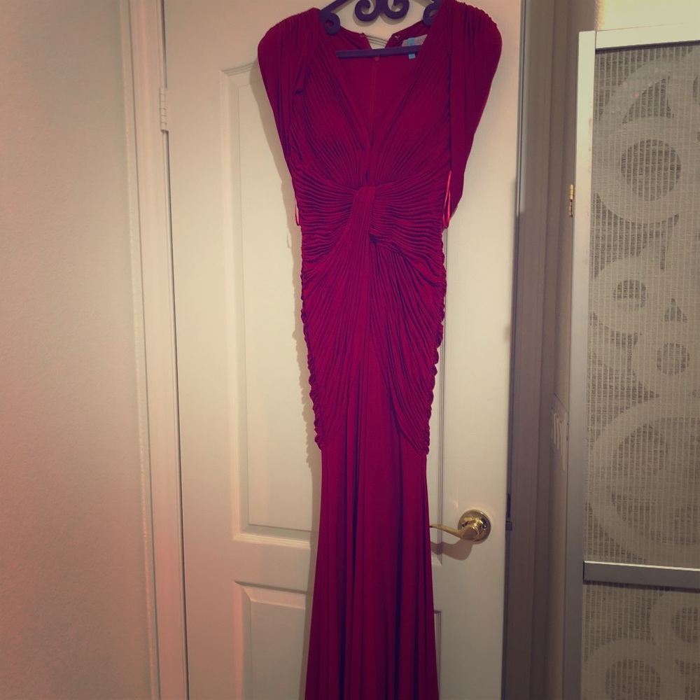 Unique red long gown with draped back